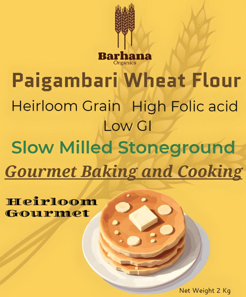 Advertisement for Barhana Organics Paigambari Wheat Flour with a stack of pancakes on a yellow background.
